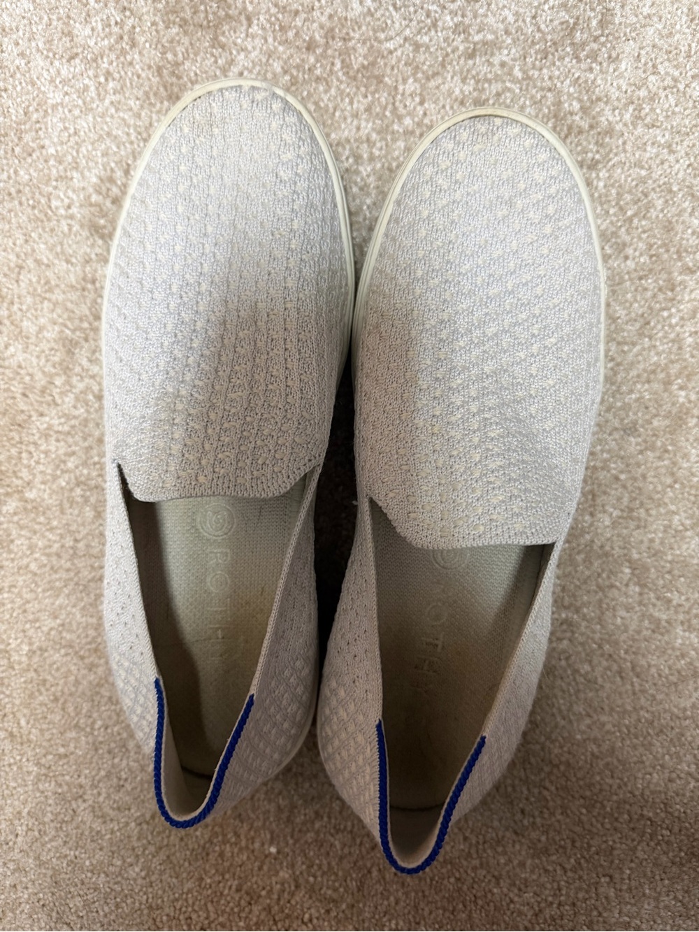Rothy's Slip-On Sneakers in Light Gray with Blue Trim